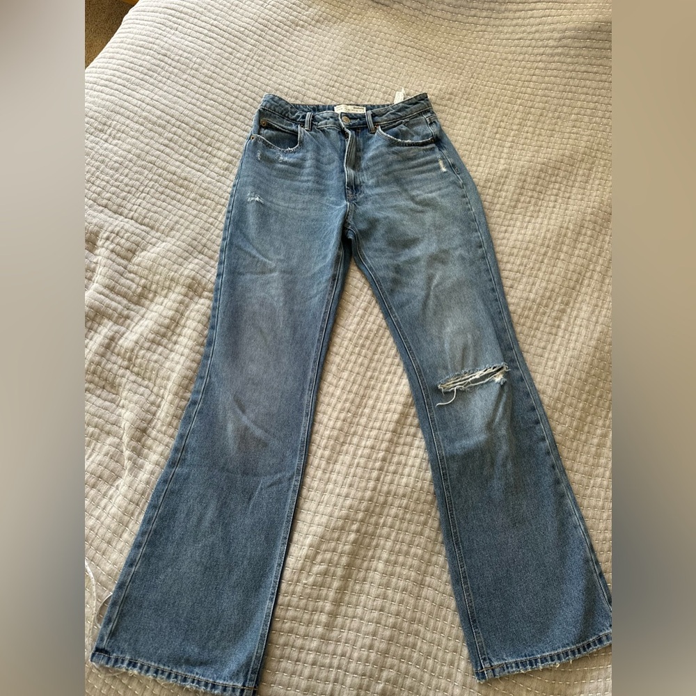 Stradivarius Denim Flare Jeans with Distressed Knee